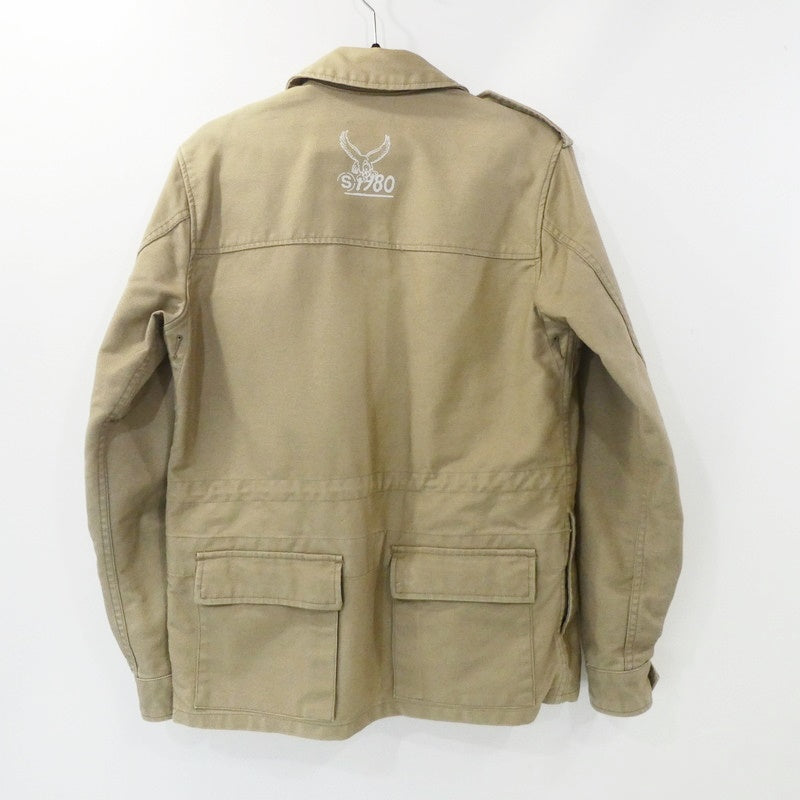 【中古】STUSSY | ステューシー MIL SPEC TRIBE WORLDWIDE RESPECT ミリタリージャケット ベージュ サイズ:S