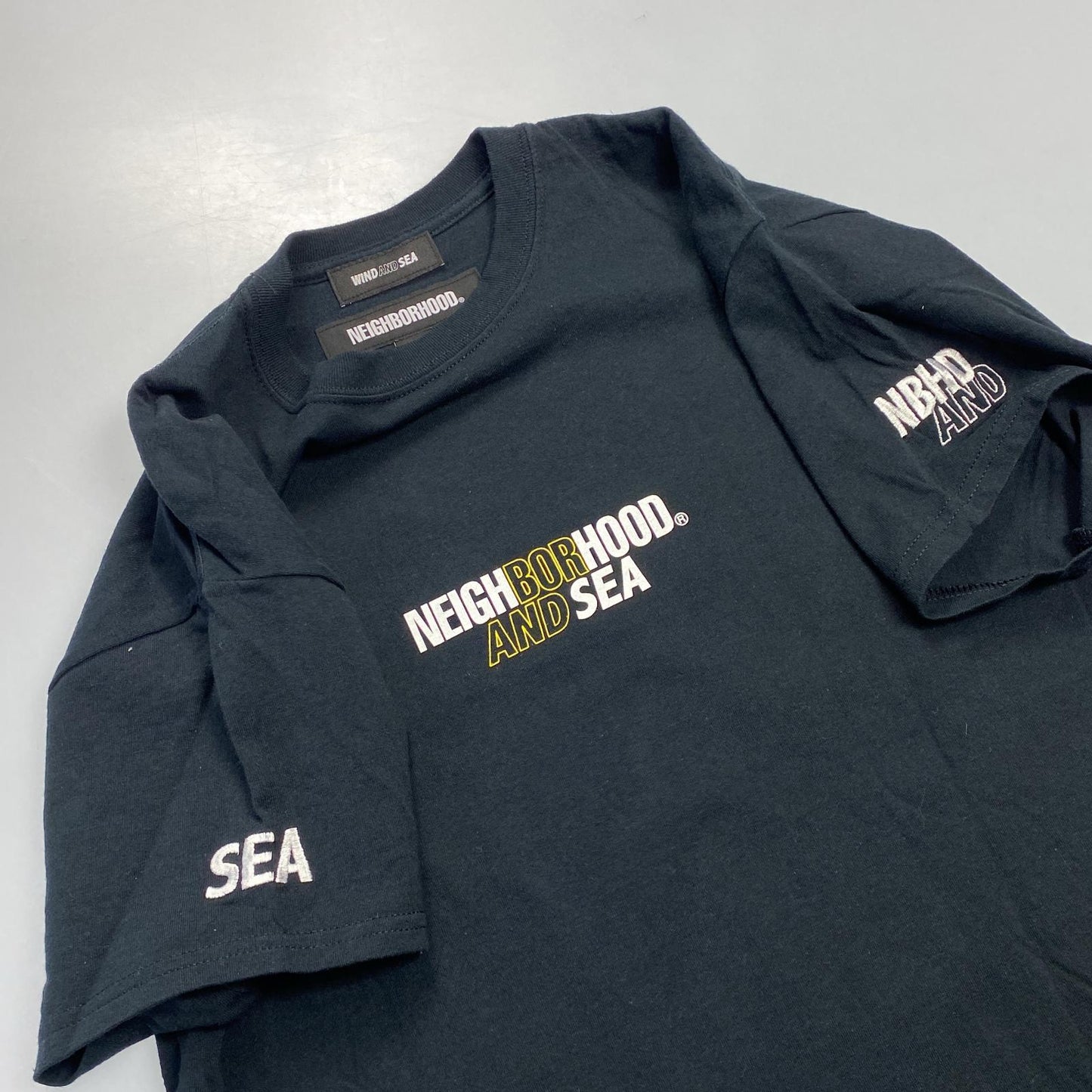 【中古】WIND AND SEA | ウィンダンシーウインダンシー 半袖Tシャツ 201ELWSN-STM01S ×NEIGHBORHOOD ブラック サイズ:L