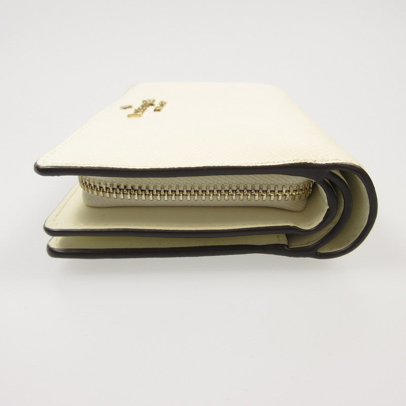 【中古】kate spade NEW YORK | ケイトスペードニューヨーク マディソンミディアムコンパクトバイフォールドウォレット 長財布 ホワイト