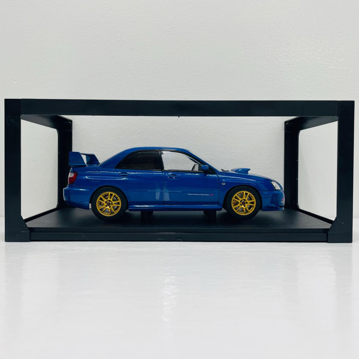 おもちゃ・玩具 1/18 スバル インプレッサ WRX STI 2003(ブルー)【飾磨店】