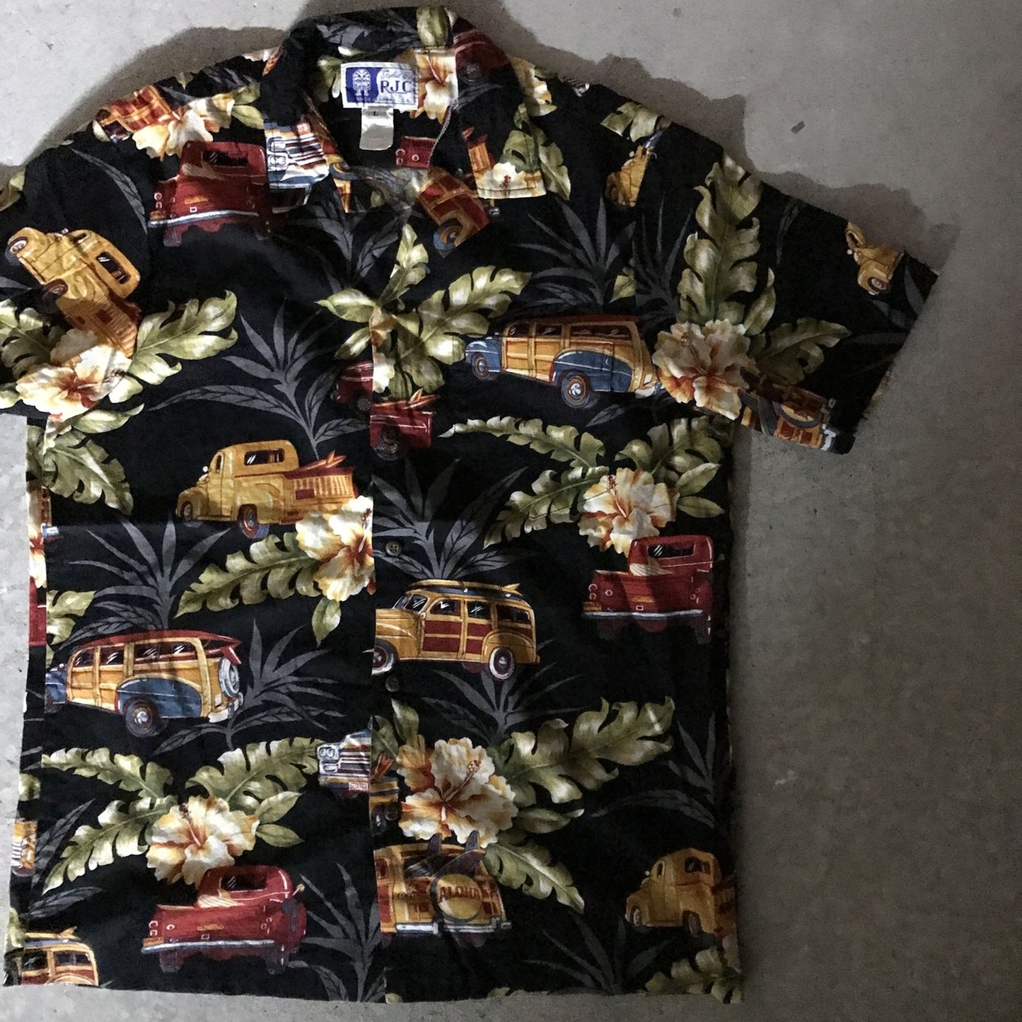 【中古】RJC | アールジェイシー 半袖シャツ 70~80年代 RJC アロハ ハワイアンシャツ ブラック WOODY WAGON 柄 ブラック サイズ:L【加古川物流】