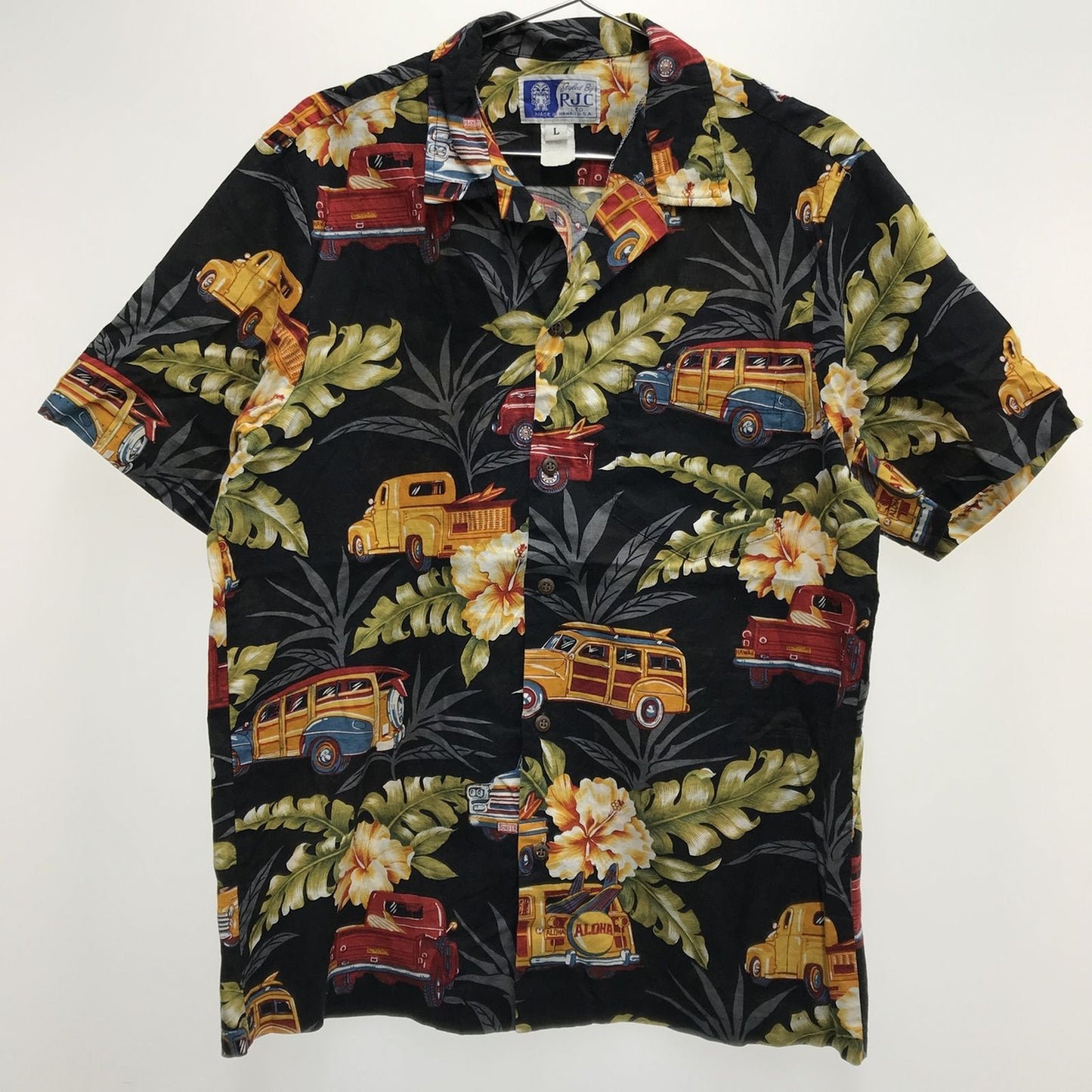【中古】RJC | アールジェイシー 半袖シャツ 70~80年代 RJC アロハ ハワイアンシャツ ブラック WOODY WAGON 柄 ブラック サイズ:L【加古川物流】