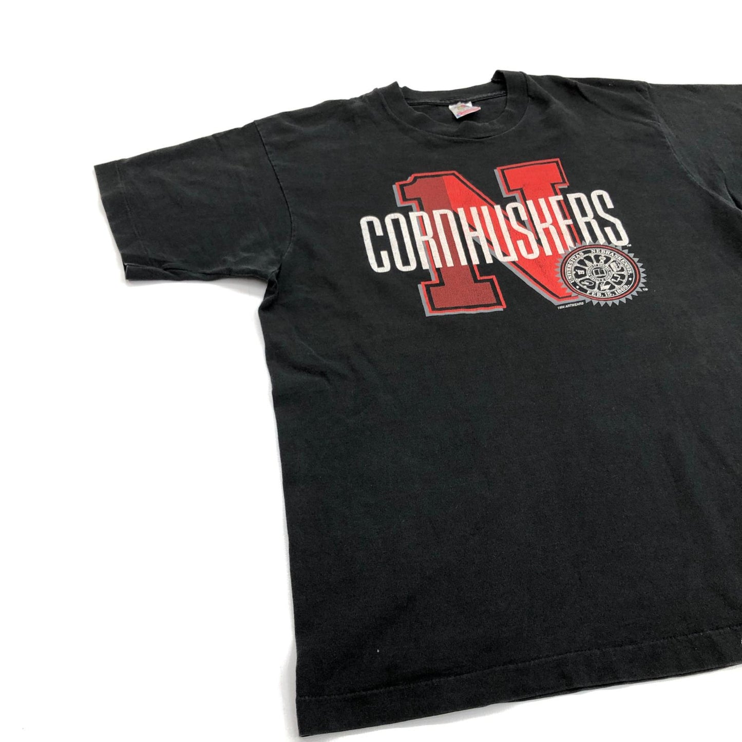 【中古】 FRUIT OF THE LOOM フルーツオブザルーム 90年代 CORNHUSKERS コーンハスカーズ チームロゴ 前面プリント シングルステッチ USA製 ヴィンテージ 半袖Tシャツ ブラック サイズ:L【加古川物流】
