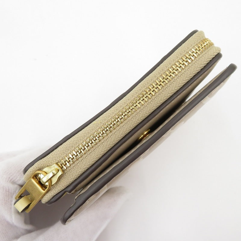 Tory Burch | トリーバーチ Tモノグラム コントラスト エンボス ウォレット 二つ折り財布 146179 020 ベージュ系【瀬戸大橋店】