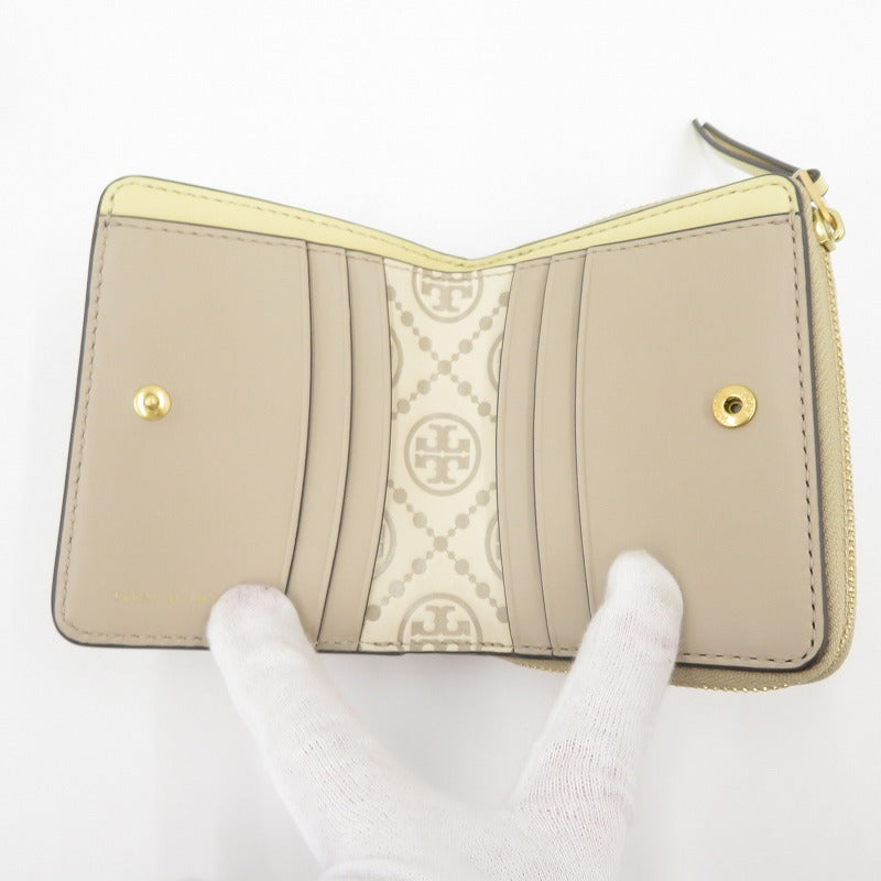 Tory Burch | トリーバーチ Tモノグラム コントラスト エンボス ウォレット 二つ折り財布 146179 020 ベージュ系【瀬戸大橋店】