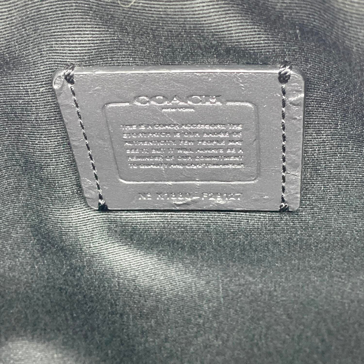 COACH コーチ クラッチバッグ 迷彩柄.,