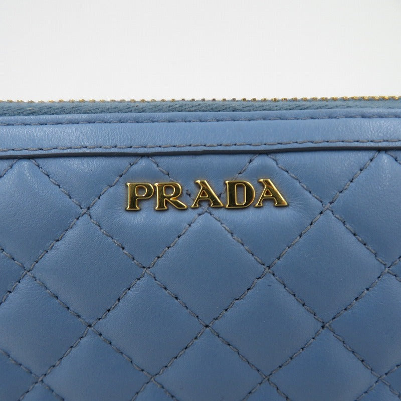 PRADA | プラダ ソフトカーフレザーキルティンクラウンドファスナー長財布 長財布 1ML506 ライトブルー【瀬戸大橋店】