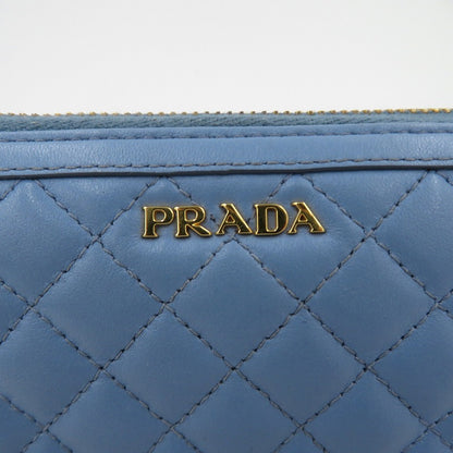 PRADA | プラダ ソフトカーフレザーキルティンクラウンドファスナー長財布 長財布 1ML506 ライトブルー【瀬戸大橋店】
