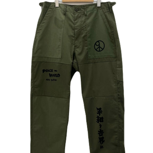 Needles | ニードルス Rebuild Fatigue Pant “Peace To パンツ 2026-PA9-006 カーキ サイズ：M【尾張小牧店】