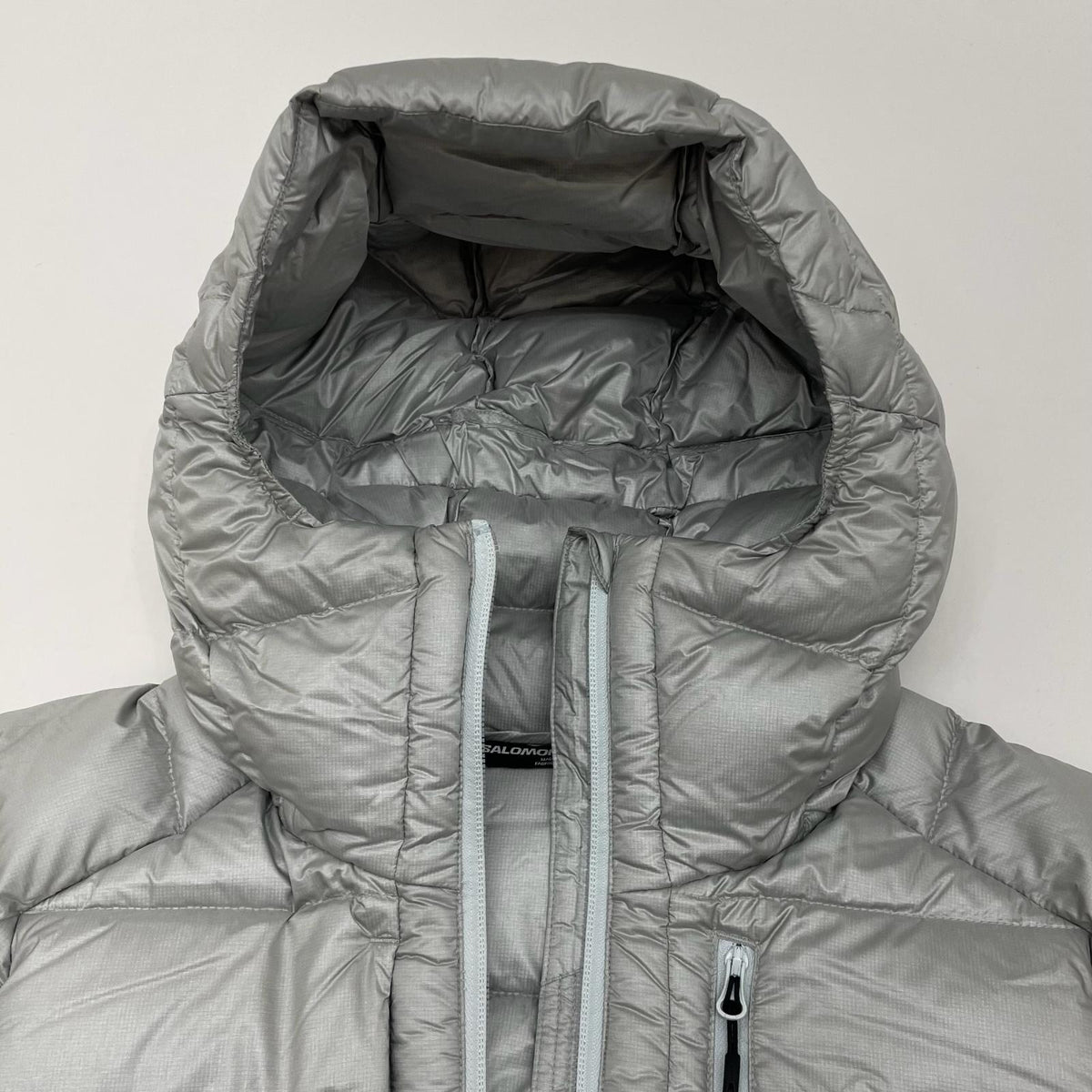 【中古】SALOMON | サロモン ELIXIR ULTRA DOWN ダウンジャケット SAFW2310087 シルバー サイズ：XS【尾張小牧店】