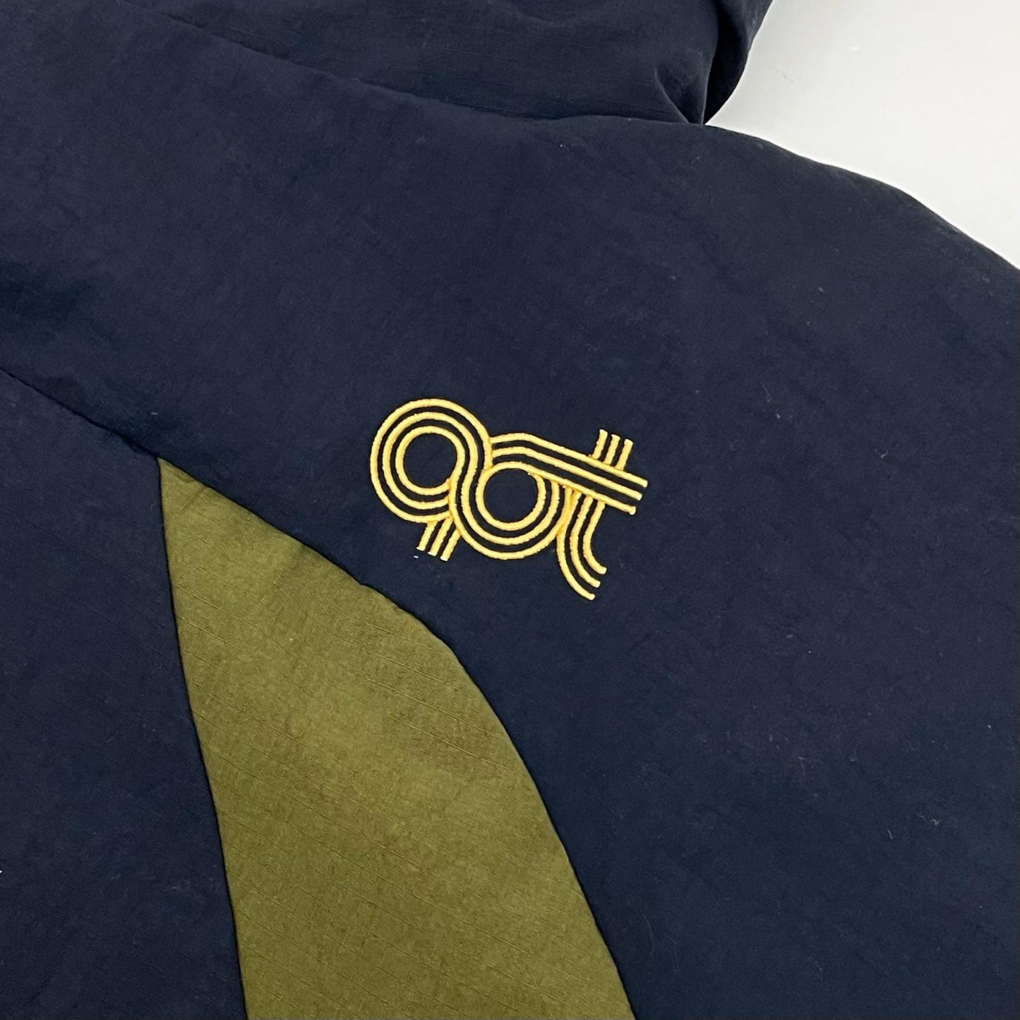 【中古】Optstuff | オプトスタフ SHELL PARKA マウンテンパーカー ネイビー×カーキ サイズ：M【尾張小牧店】