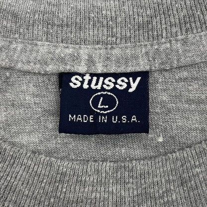 【中古】STUSSY | ステューシー ジャズマン 紺タグ　半袖Ｔシャツ グレー サイズ：L【尾張小牧店】