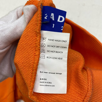 ADERERROR | アーダーエラー CREW NECK InVADER SWEAT スウェット 20ASSTO28OR1 オレンジ【加古川店】