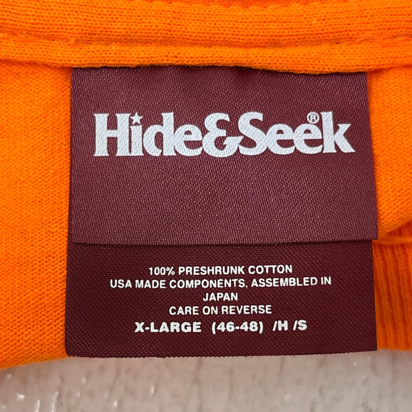 HIDE AND SEEK | ハイドアンドシーク racing l/s tee 長袖Ｔシャツ オレンジ サイズ：XL【加古川店】