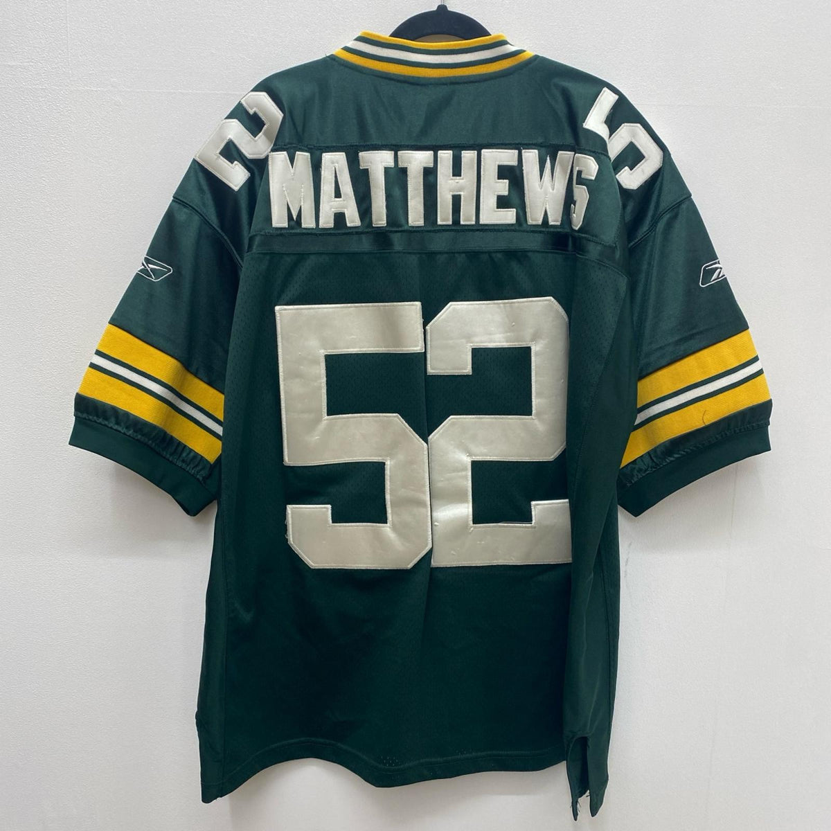 Reebok ｸﾞﾘｰﾝﾍﾞｲﾊﾟｯｶｰｽﾞﾕﾆﾌｫｰﾑ No.52 サイズ:50(XL) クレイ・マシューズ アメフト フットボール【加古川店】