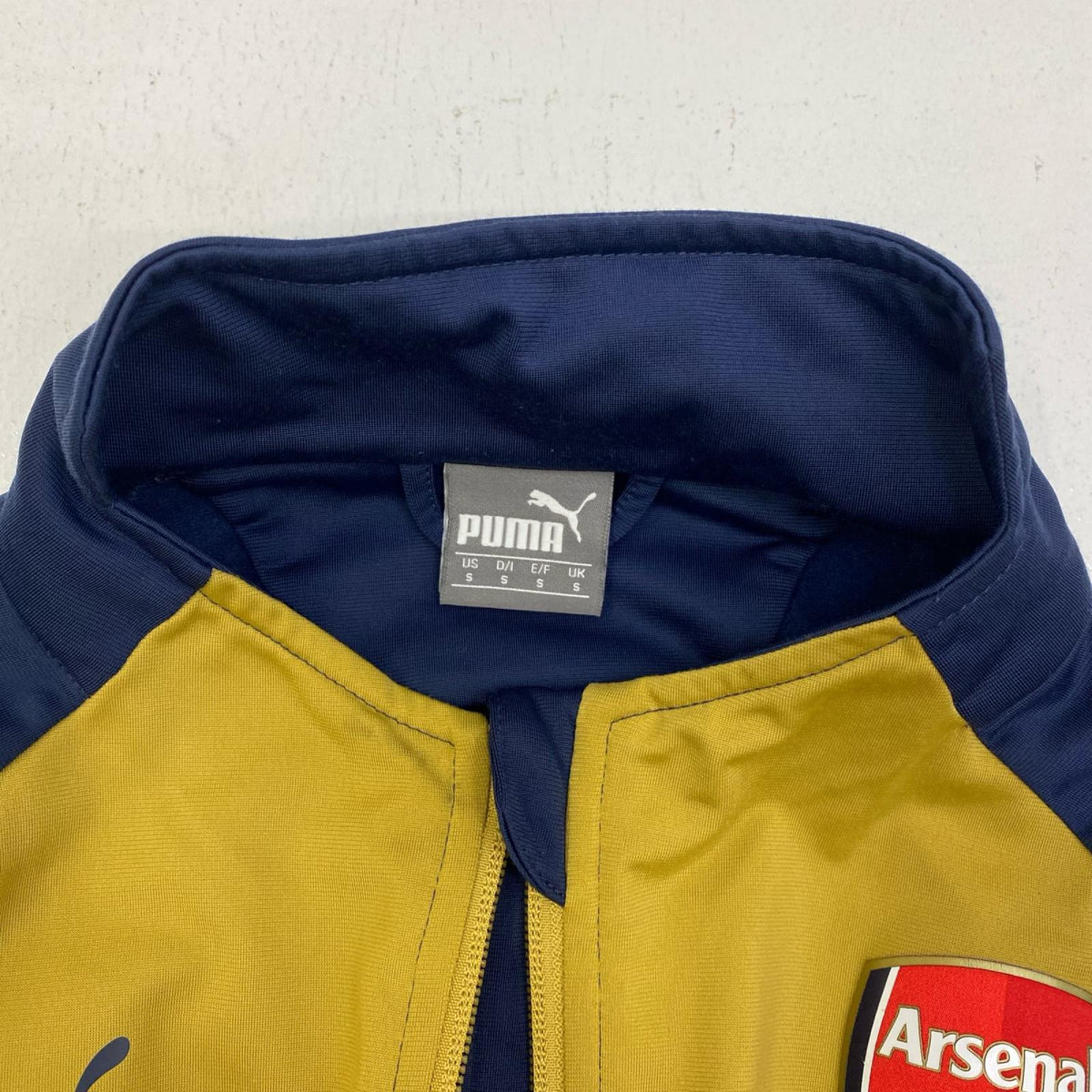 PUMA | プーマ PUMA ｱｰｾﾅﾙ15/16 ﾄﾗｯｸｼﾞｬｹｯﾄ ﾖｺﾞﾚ有 size:S【加古川店】