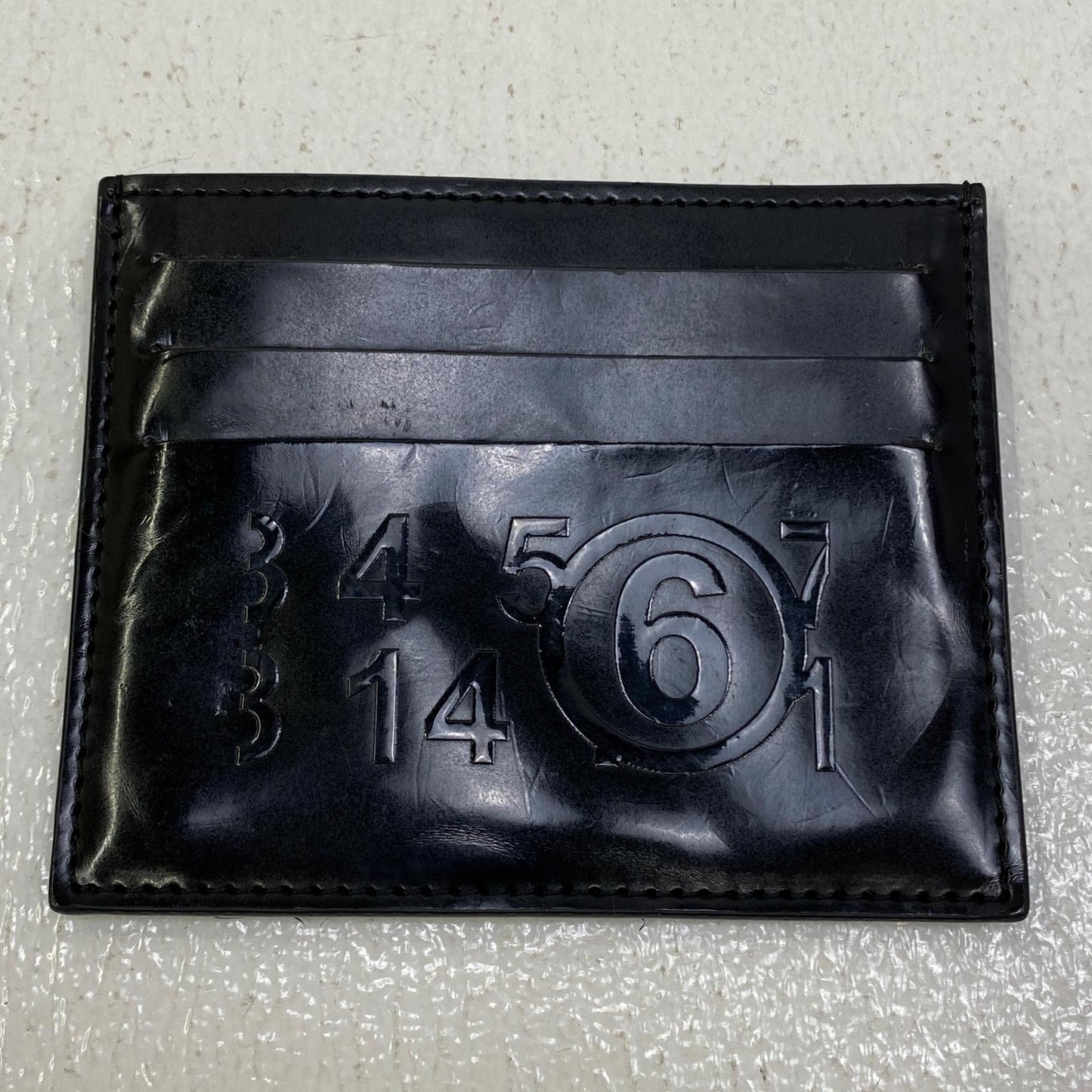【中古】MM6(Maison Margiela) | エムエムシックスメゾンマルジェラ エンボスロゴ カードホルダー カードケース S54UI0129 P3935 T8013 ブラック【加古川店】