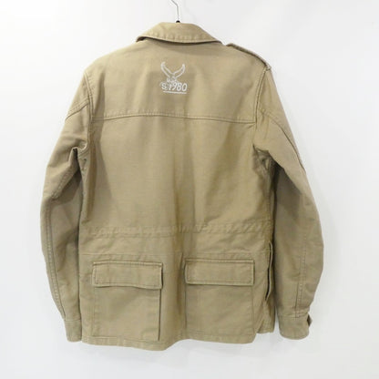 【中古】STUSSY | ステューシー MIL SPEC TRIBE WORLDWIDE RESPECT ミリタリージャケット ベージュ サイズ：S