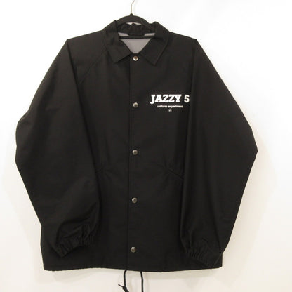 【中古】uniform experiment | ユニフォームエクスペリメント FRAGMENT JAZZY 5 COACH JACKET その他アウター UE-23000 ブラック サイズ：1