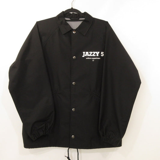 【中古】uniform experiment | ユニフォームエクスペリメント FRAGMENT JAZZY 5 COACH JACKET その他アウター UE-23000 ブラック サイズ：1