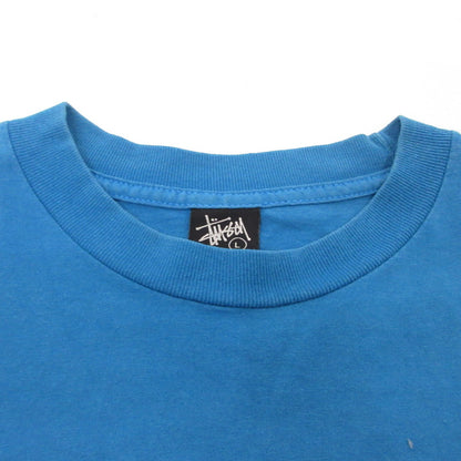 【中古】STUSSY | ステューシー サーフマン 半袖Ｔシャツ ブルー サイズ：L