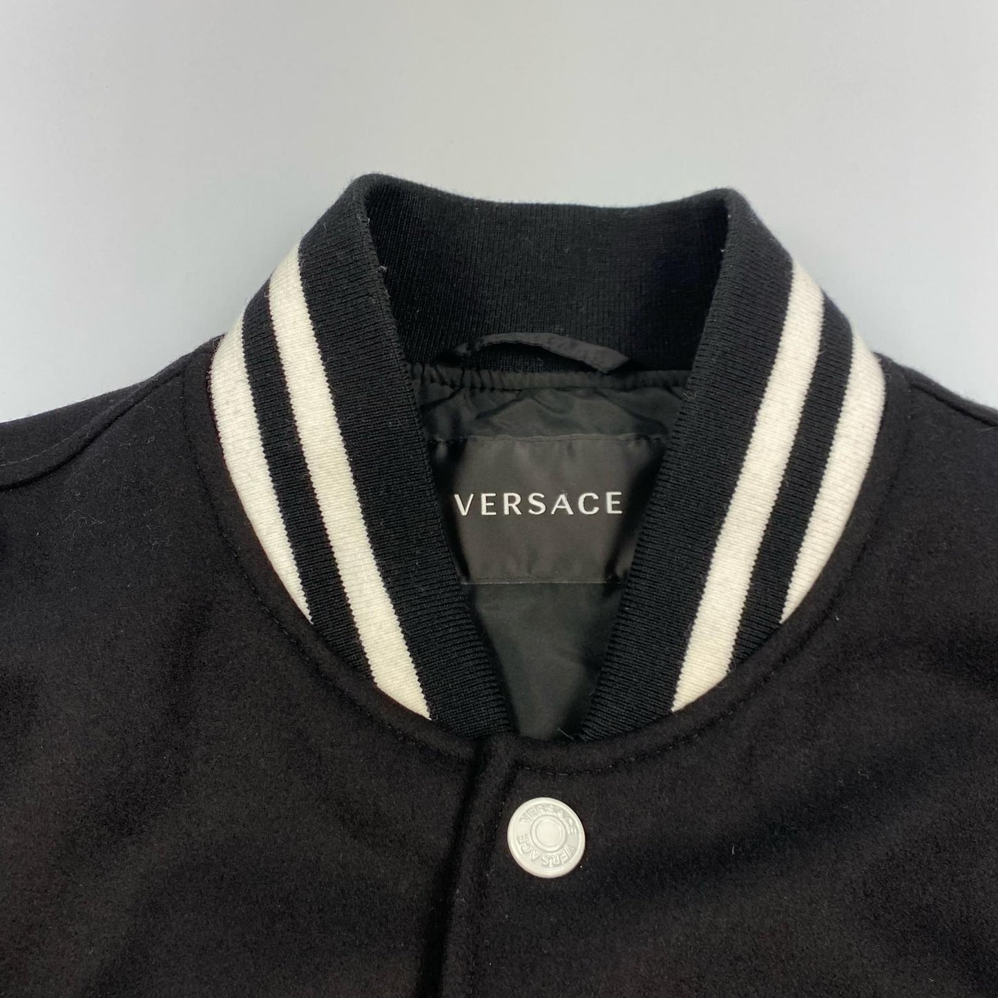 VERSACE | Versace varsity jacket 1012284 1A0864 Black Size: 48