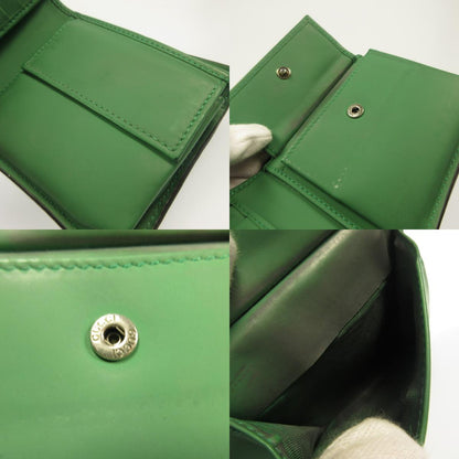 GUCCI | グッチ ラバーエフェクト 二つ折り財布 771311