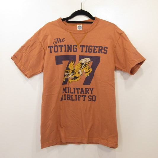 TOYS McCOY | トイズマッコイ THE TOTING TIGERS 77 半袖Ｔシャツ TMC2529 オレンジ サイズ：M