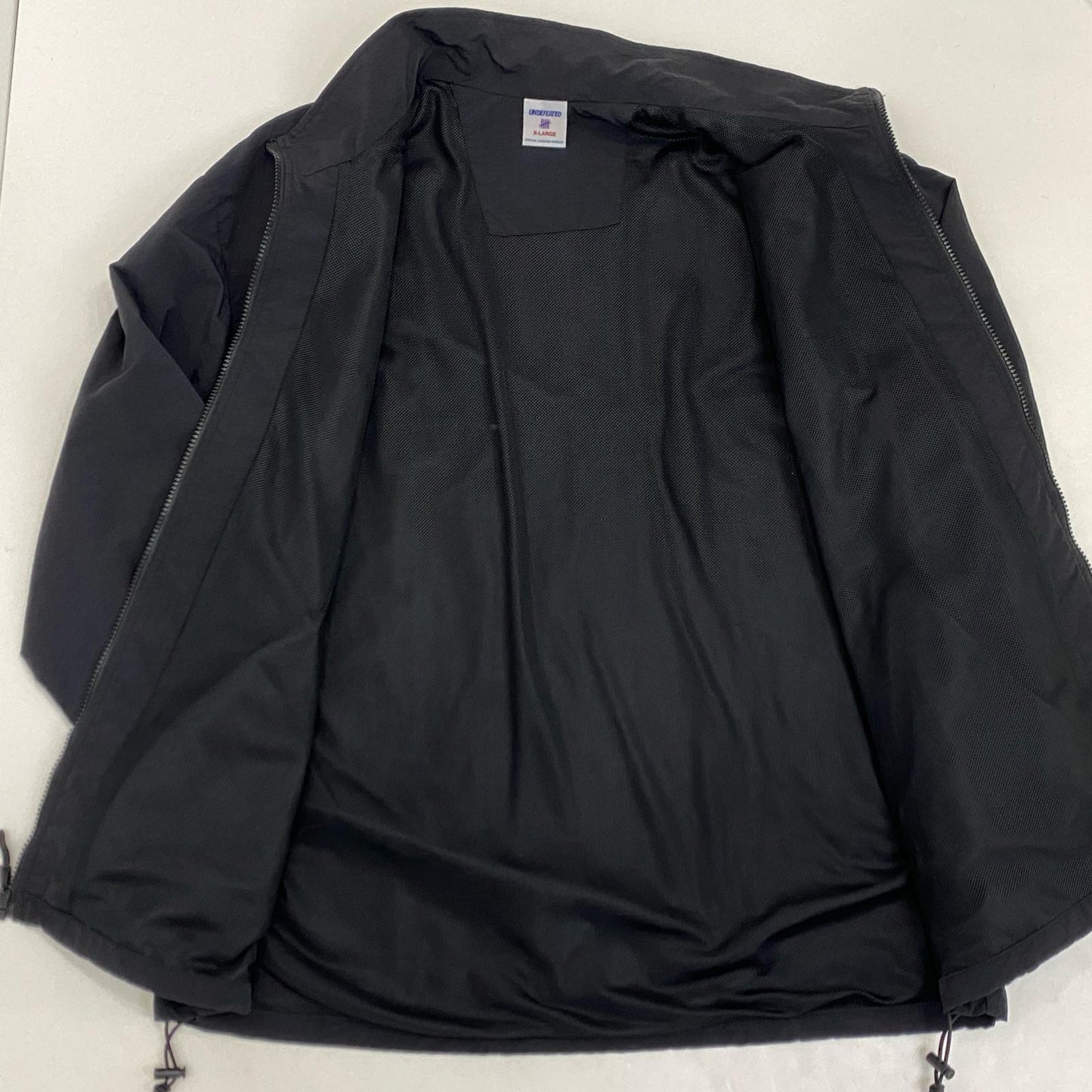 UNDEFEATED | アンディフィーテッド ナイロンジャケット ブラック サイズ：XL【姫路東店】