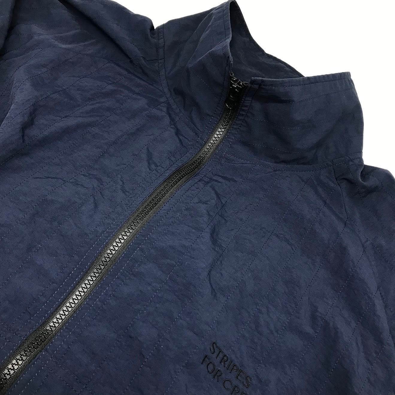 S.F.C ｜ エスエフシー　ストライプスフォークリエイティブ 】ストライプ ステッチ ジャケット STRIPE STITCH JACKET ナイロンジャケット SFCSS24J05 ネイビー サイズ：XXL【倉吉店】