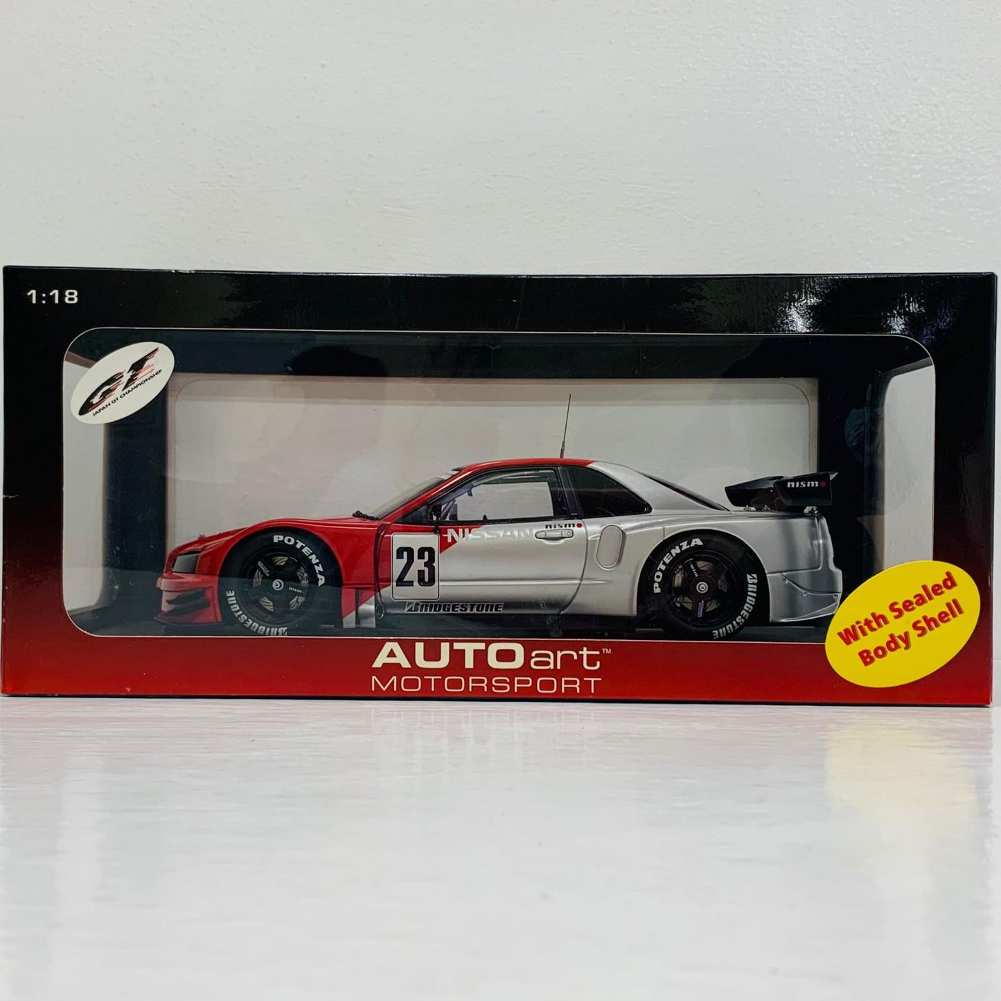 おもちゃ・玩具 1/18 ニッサン 2003 JGTC GT500 スカイライン GT-R(R34) テストカー #23(レッド×シルバー) 【飾磨店】