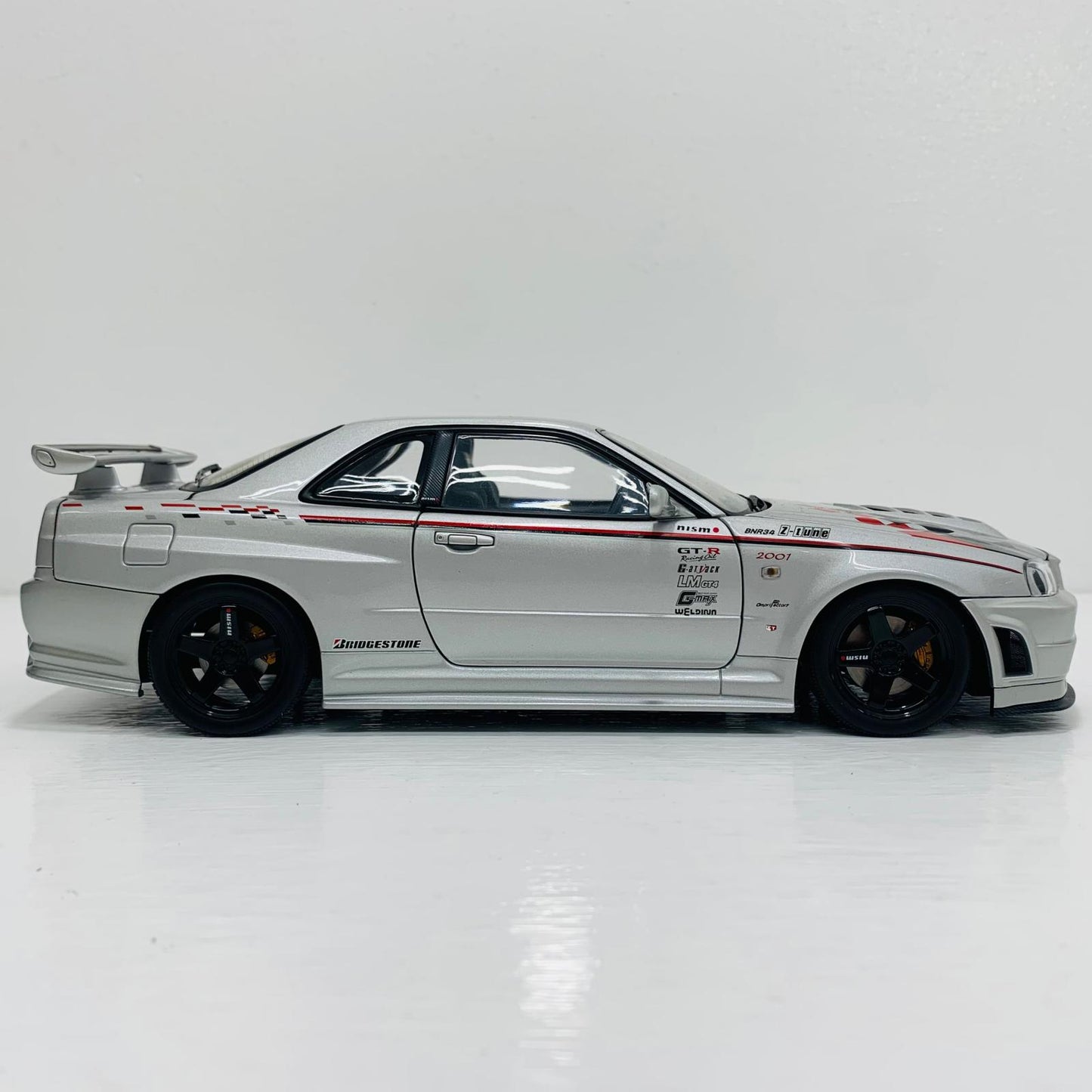 おもちゃ・玩具 1/18 NISSAN SKYLINE R34 GTR NISMO Z-tune VERSION BRIDGESTON【飾磨店】