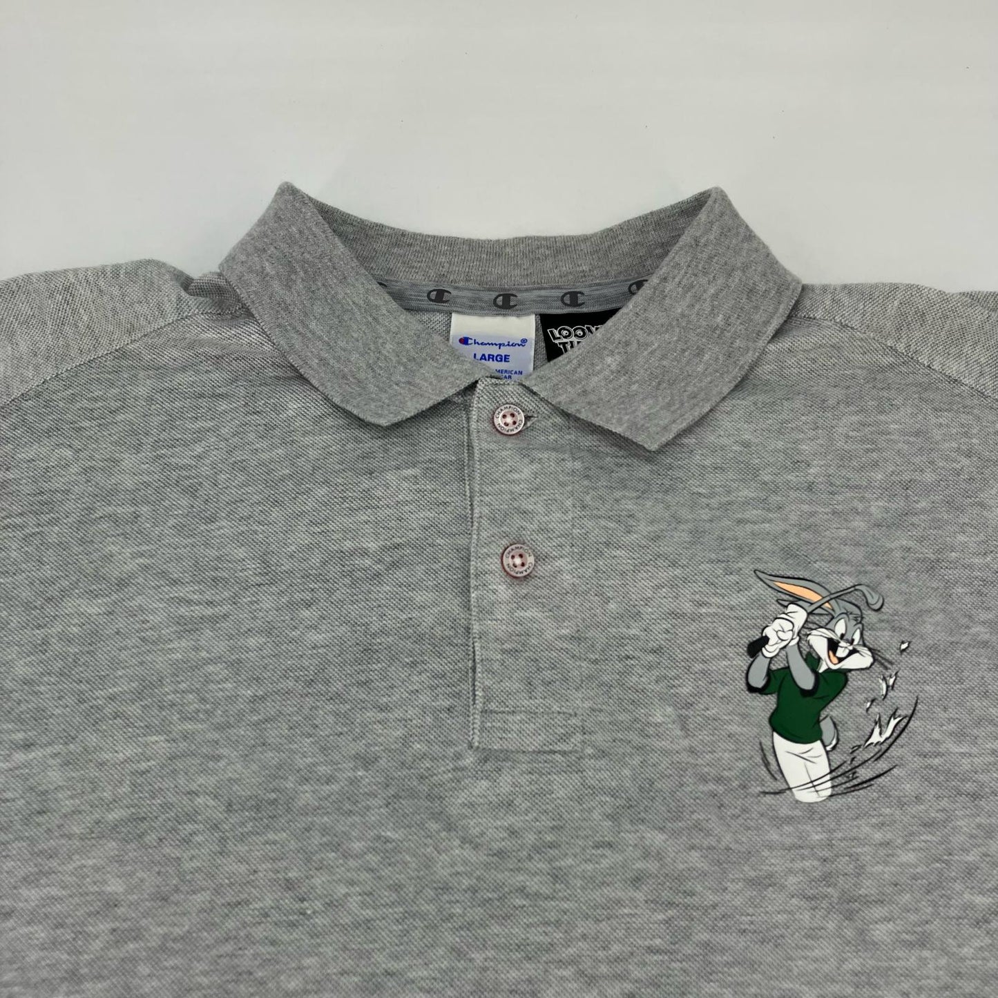 Champion | チャンピオン Champion×LOONEY TUNES ポロシャツ C8-SG301 グレー サイズ：L【イオン広店】