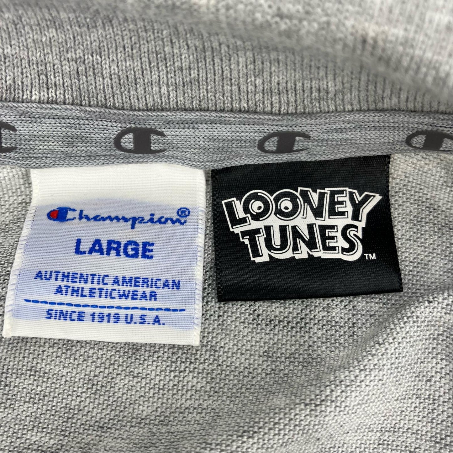 Champion | チャンピオン Champion×LOONEY TUNES ポロシャツ C8-SG301 グレー サイズ：L【イオン広店】