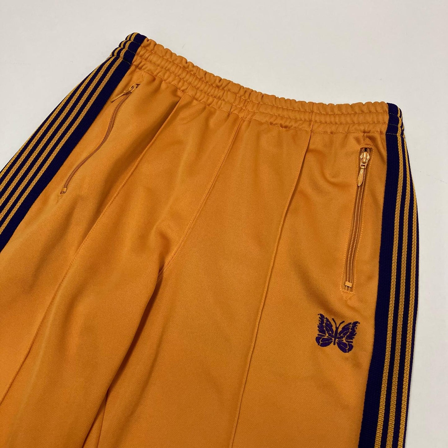 Needles | ニードルス TRACK PANT POLY SMOOTH パンツ KP220 オレンジ サイズ：S【イオン広店】