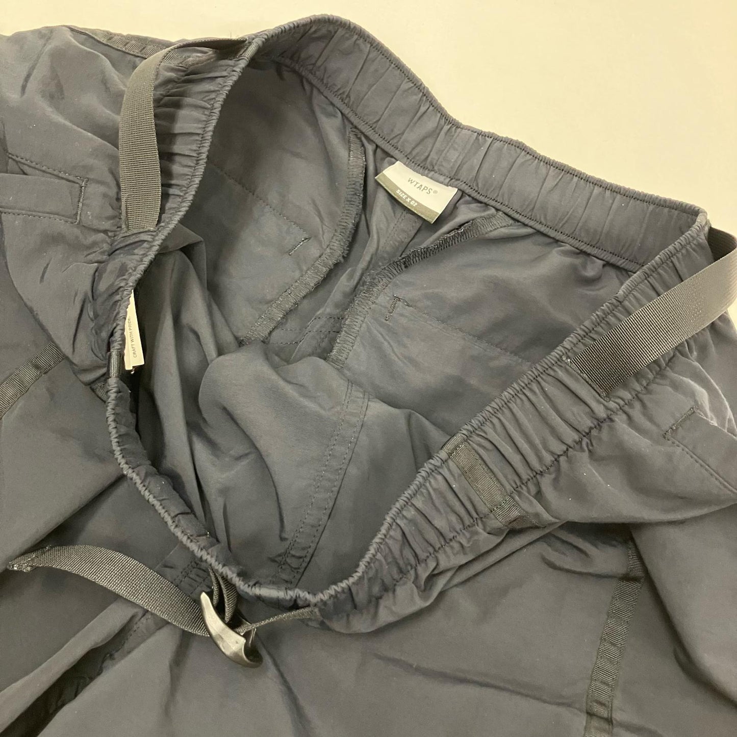 W)TAPS | ダブルタップス TRACKS SHORTS/SHORTS ショートパンツ 201TQDT-PTM02 ブラック サイズ：2【イオン広店】