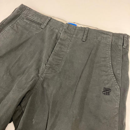 UNDEFEATED | アンディフィーテッド OFFICER CHINO チノパンツ 213077204002 ブラック サイズ：34【イオン広店】