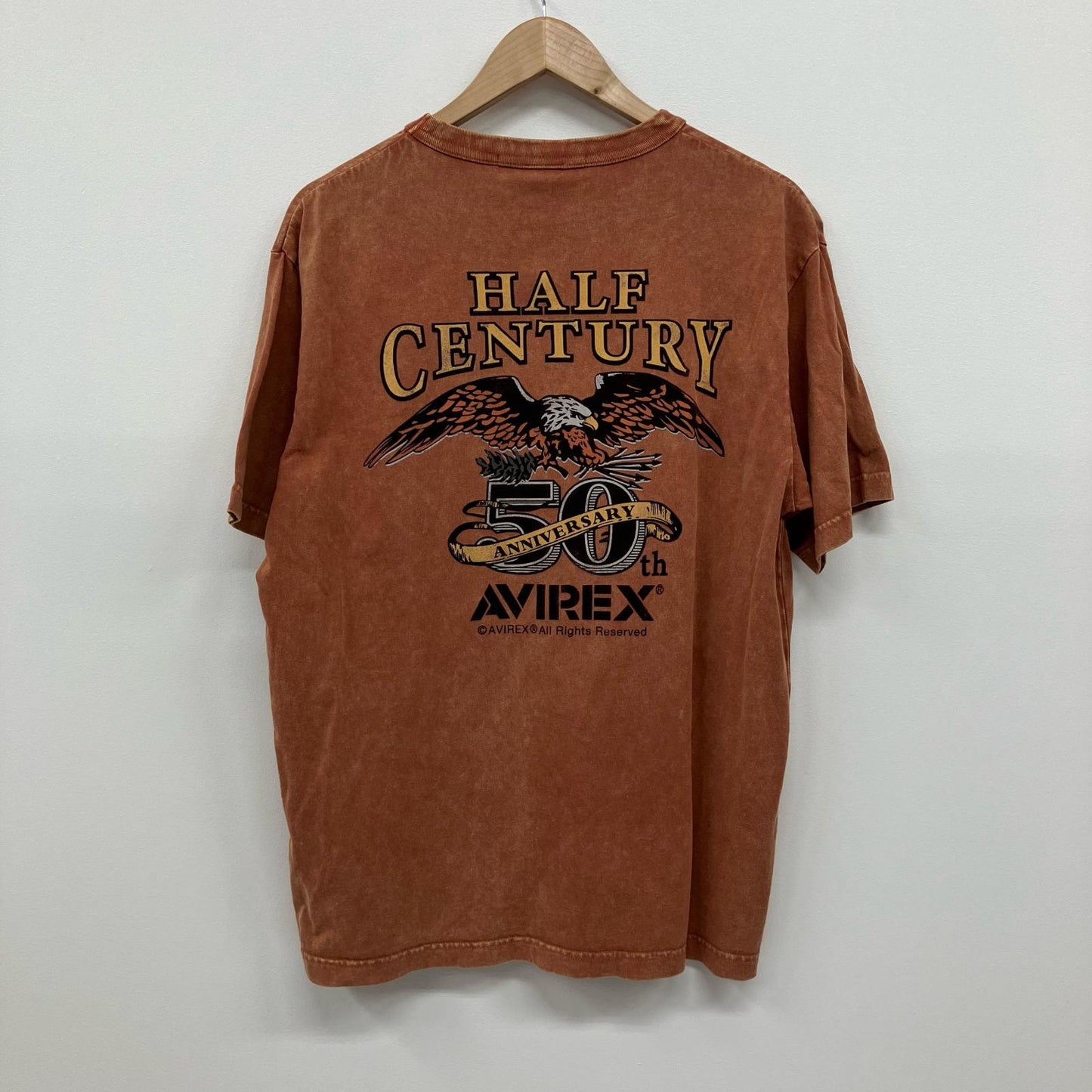 AVIREX | アヴィレックス HALF CENTURY ANNIV TEE 半袖Ｔシャツ 783-5234001 ブラウン サイズ：L【イオン広店】