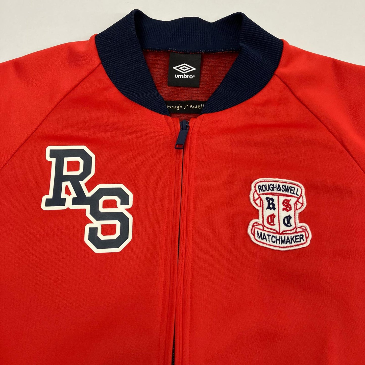 UMBRO | アンブロ レタードアスレチックジャケット ジャージ RAS2390 レッド サイズ：L【イオン広店】