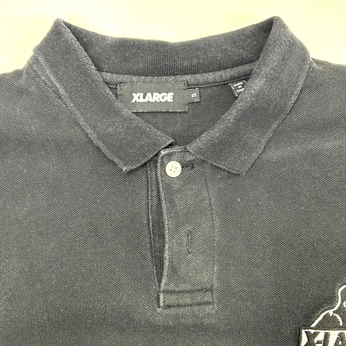 X-LARGE | エクストララージ S/S POLO SHIRT ポロシャツ 01191303 ブラック サイズ：S【イオン広店】