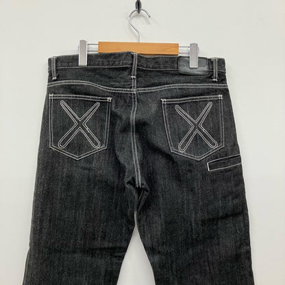 KAWS OriginalFake デニムパンツ インディゴ【イオン広店】
