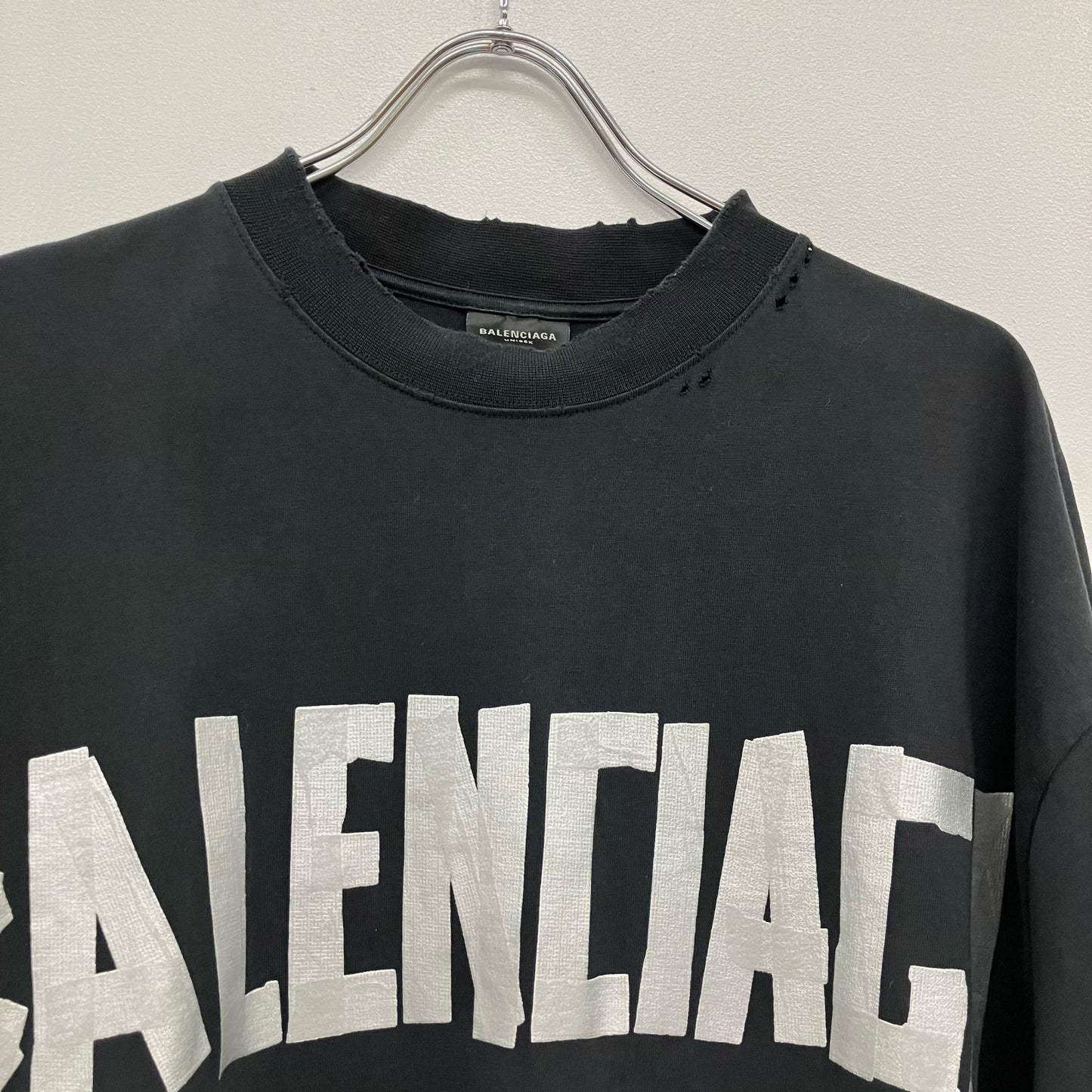 BALENCIAGA | バレンシアガ テープロゴ オーバーサイズ Tシャツ 半袖Ｔシャツ ブラック サイズ：S【イオン広店】