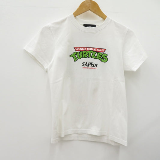 SAPEur | サプール ×TURTLES 半袖Ｔシャツ ホワイト サイズ：L【瀬戸大橋店】