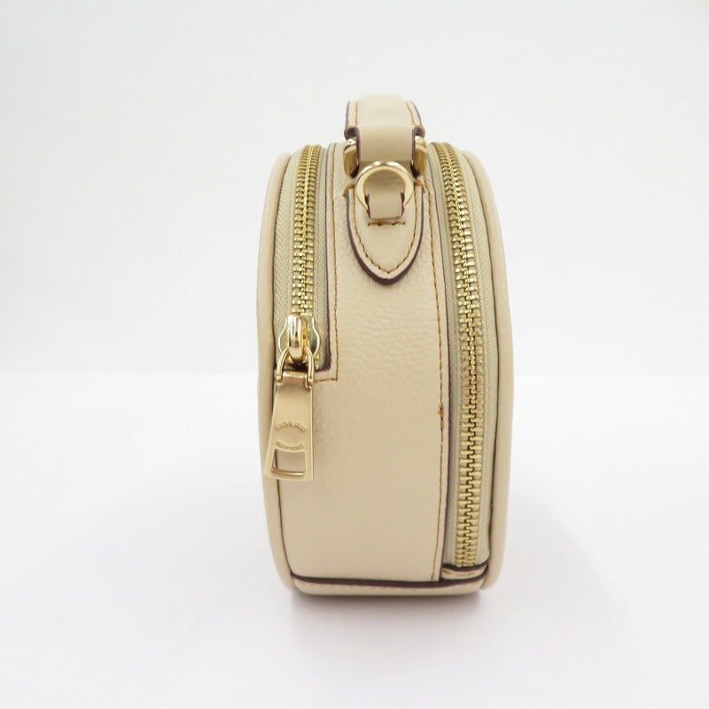 COACH | コーチ X PEANUTS キャンティーン クロスボディ ショルダーバッグ H2281-CE845 ベージュ【瀬戸大橋店】