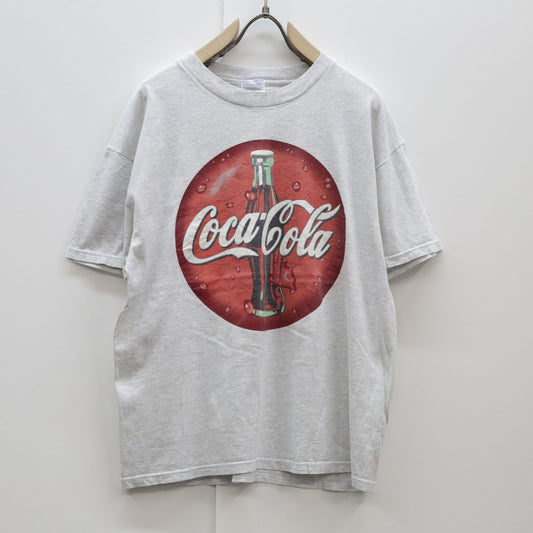 【中古】Hanes | ヘインズ 半袖Ｔシャツ ヘインズ 00年代 半袖 Tシャツ Coca-Cola コカ・コーラ HEAVYWEIGHT グレー L グレー サイズ：L【加古川物流】