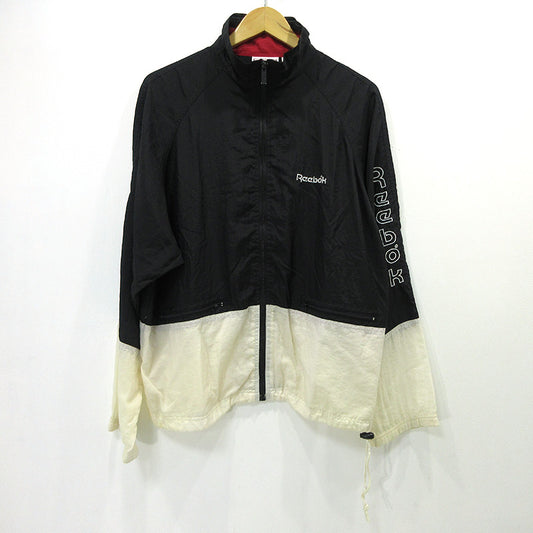 Reebok | リーボック その他アウター リーボック スタンドカラー 袖刺繍入り 切り替え ナイロンジップジャケット白黒 XL 長袖 ブラック サイズ：M【三重本店】
