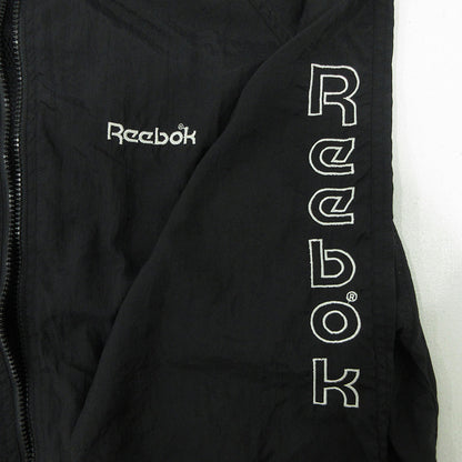 Reebok | リーボック その他アウター リーボック スタンドカラー 袖刺繍入り 切り替え ナイロンジップジャケット白黒 XL 長袖 ブラック サイズ：M【三重本店】
