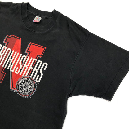 【中古】 FRUIT OF THE LOOM　フルーツオブザルーム　90年代　CORNHUSKERS　コーンハスカーズ　チームロゴ　前面プリント　シングルステッチ　USA製　ヴィンテージ 半袖Ｔシャツ ブラック サイズ：L【加古川物流】
