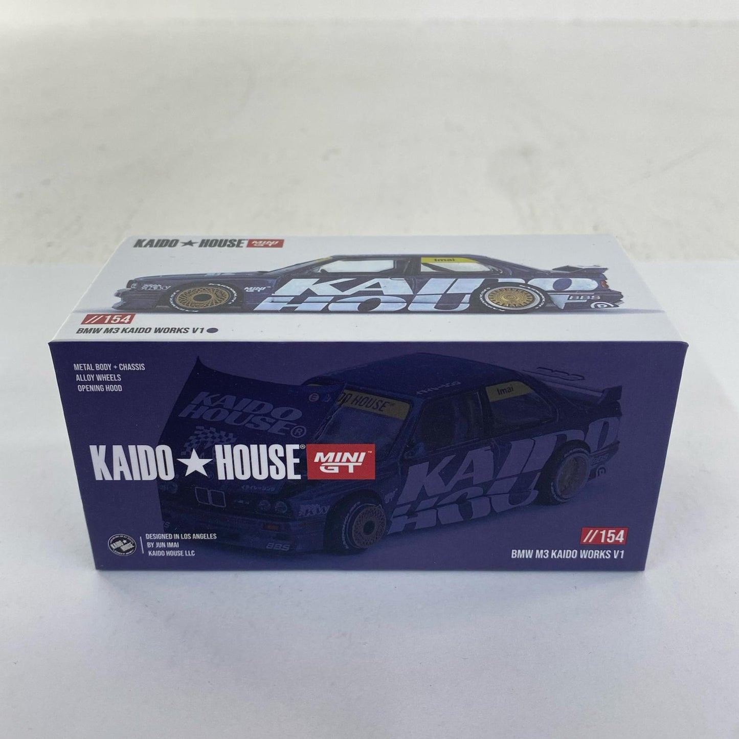 1/64 BMW M3 (E30) Kaido Works V1 (Left-Hand Drive) "KAIDO HOUSE x MINI GT Series" [KHMG154]