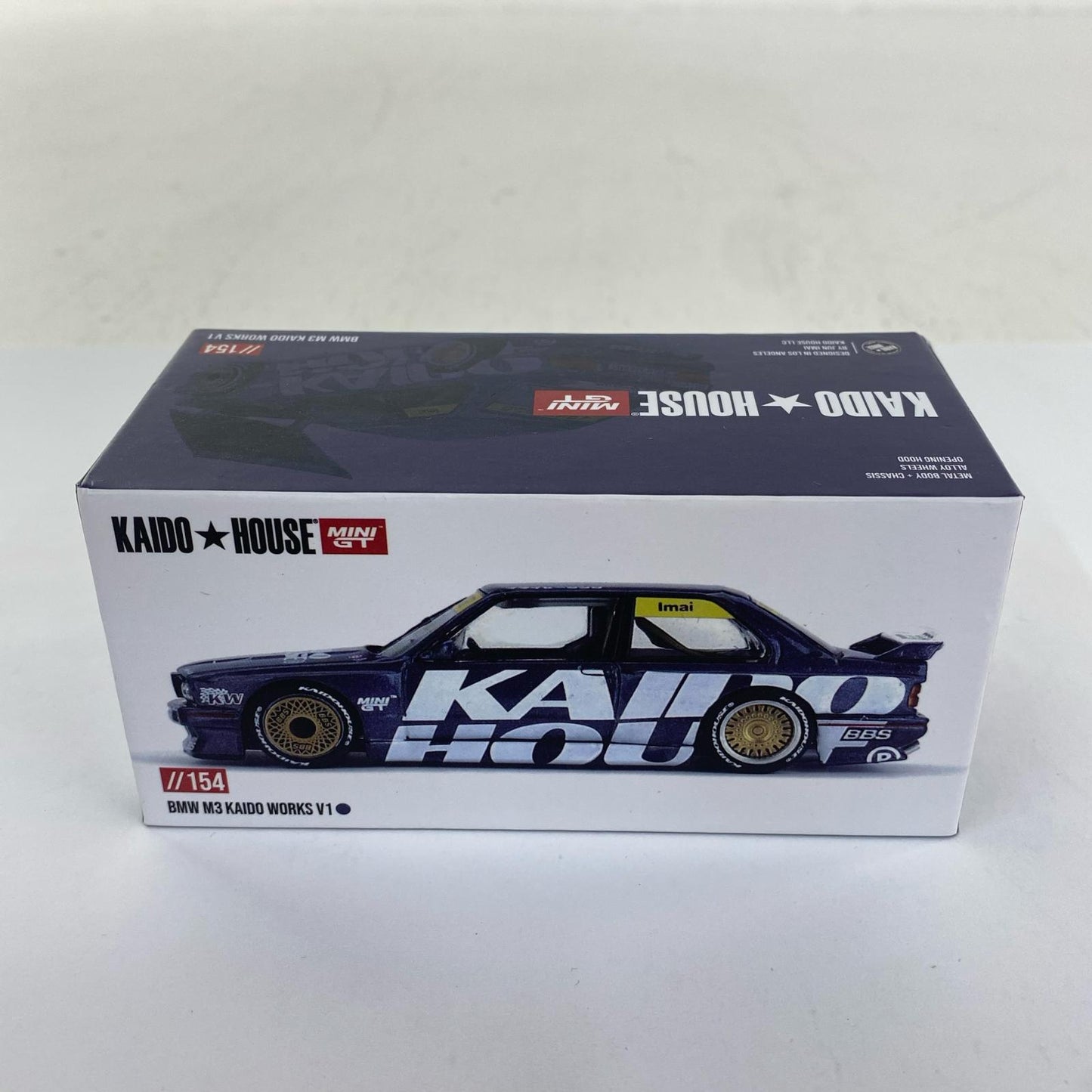 1/64 BMW M3 (E30) Kaido Works V1 (Left-Hand Drive) "KAIDO HOUSE x MINI GT Series" [KHMG154]